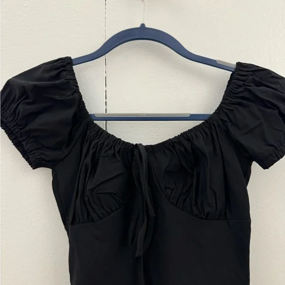 Black mini dress with puffy sleeves. Never worn. - Picture 2 of 3